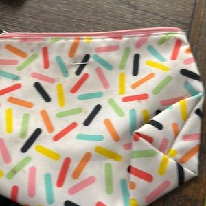 Colorful Clinique cosmetic bag